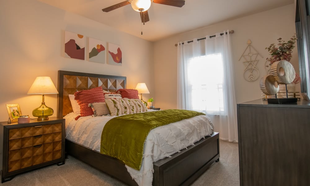 Loft apartment bedroom at Bend at New Road Apartments in Waco, Texas
