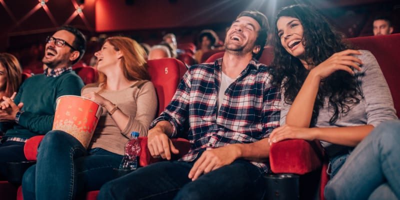 Residents at a movie theater near Evergreen in Joint Base Lewis McChord, Washington