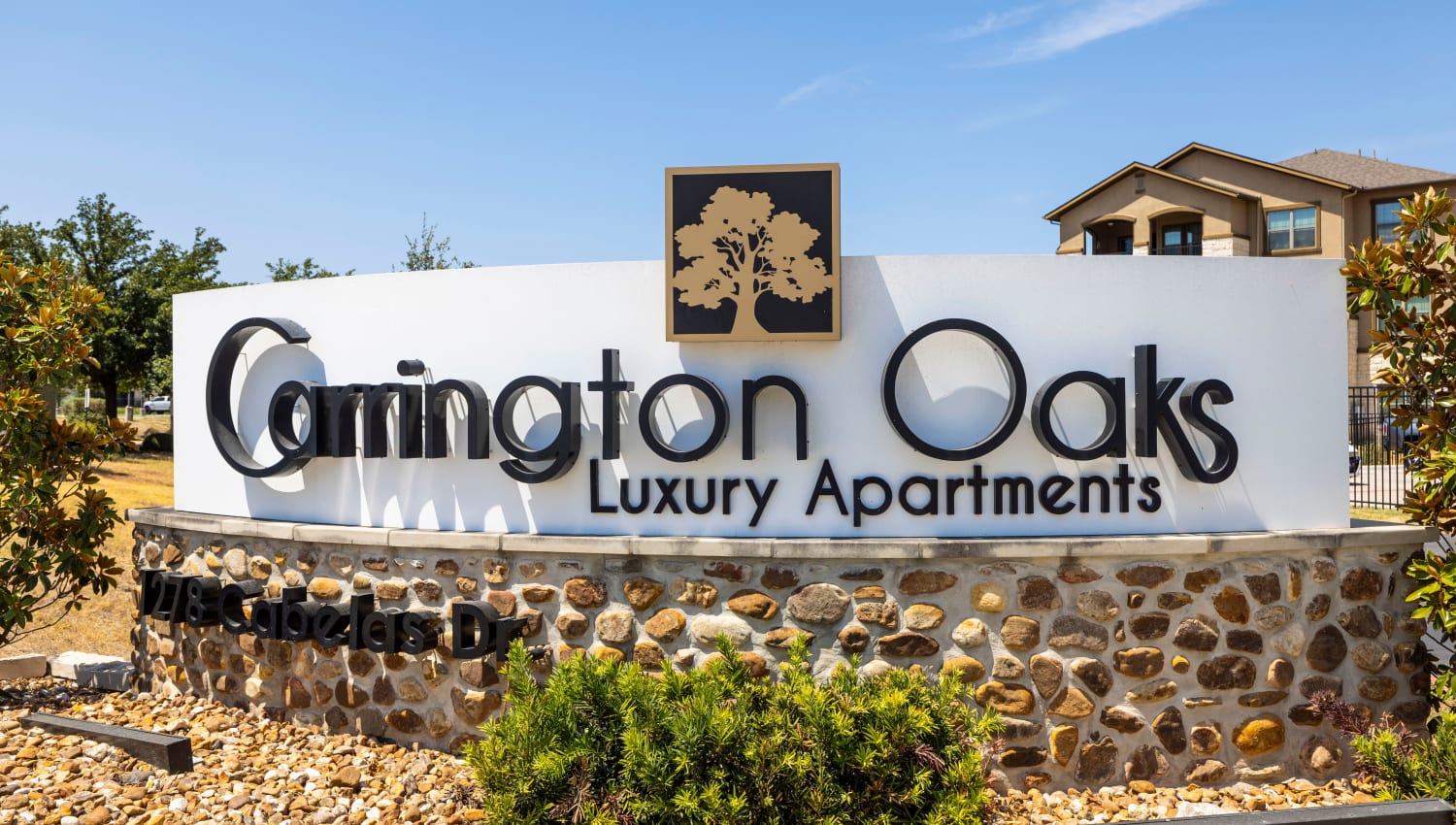 Our sign welcoming residents and their guests to Carrington Oaks in Buda, Texas