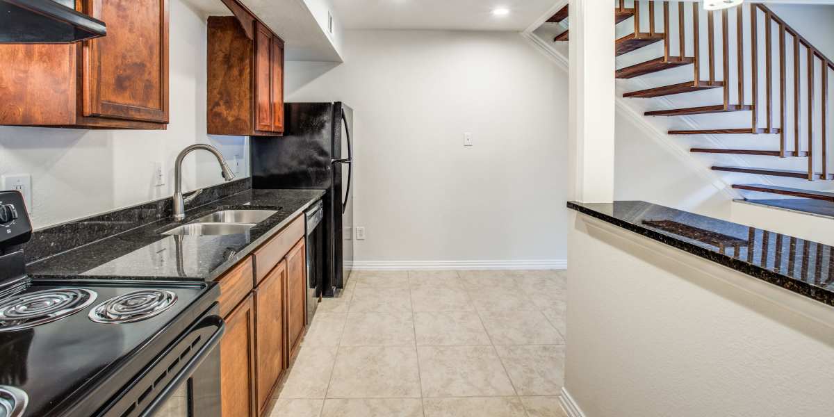 Apartment kitchen at Tucasa Townhomes in Irving, Texas