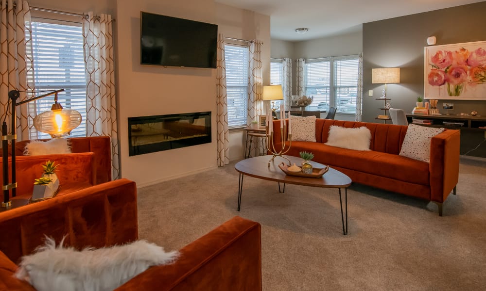 Bright, spacious living with carpet at Stonehorse Crossing Apartments in Oklahoma City, Oklahoma