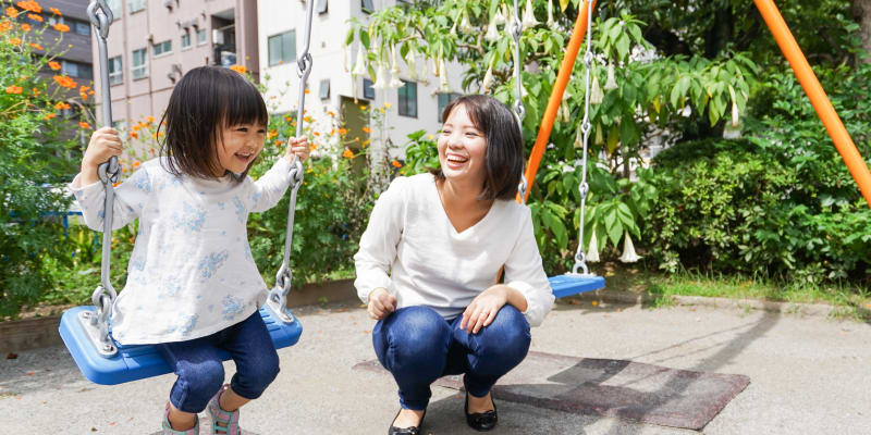 a mother and daughter playing at a school near The Village at New Gosport in Portsmouth, Virginia