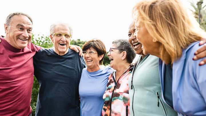 Group of senior friends taking a photo / senior cooperative living