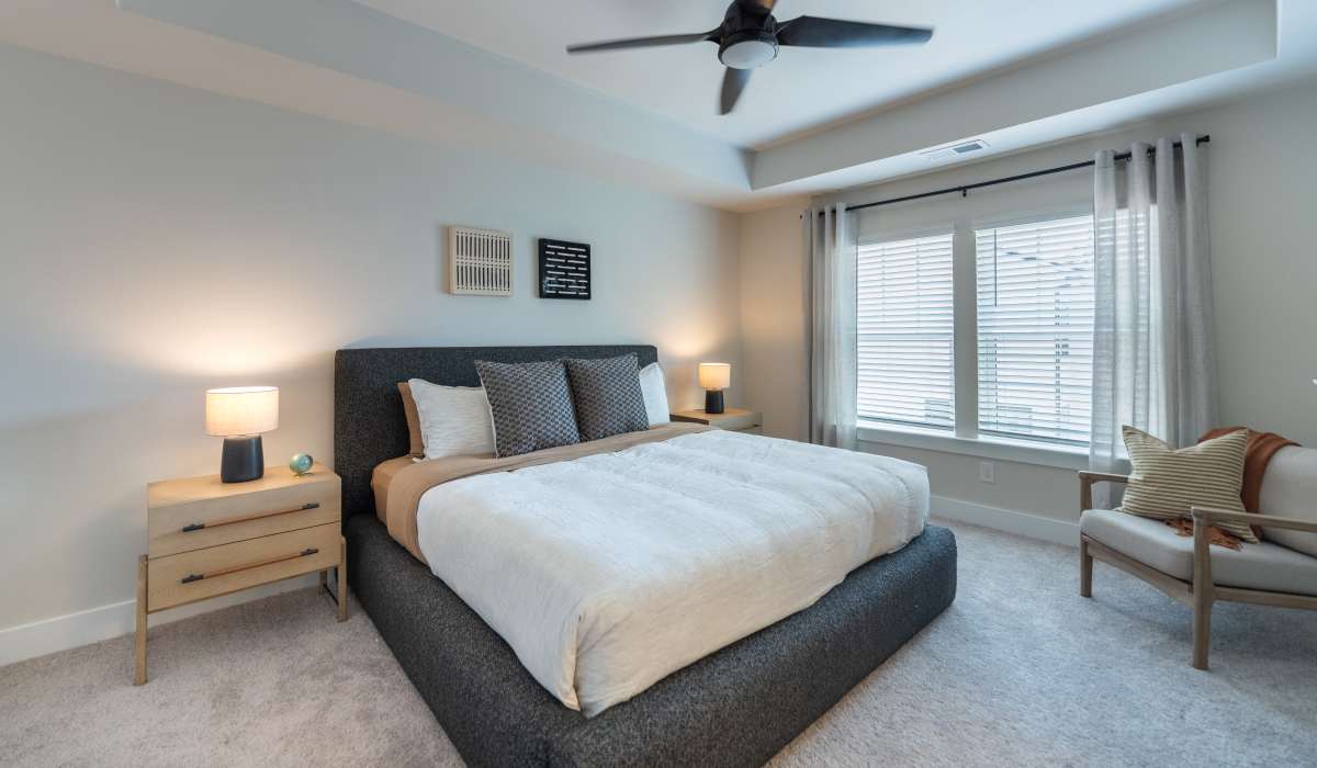 Living room with couch and windows at Maybrook Terraces in Greenville, South Carolina