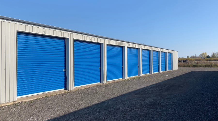 Storage units with blue doors and locks at KO Storage in Superior, Wisconsin