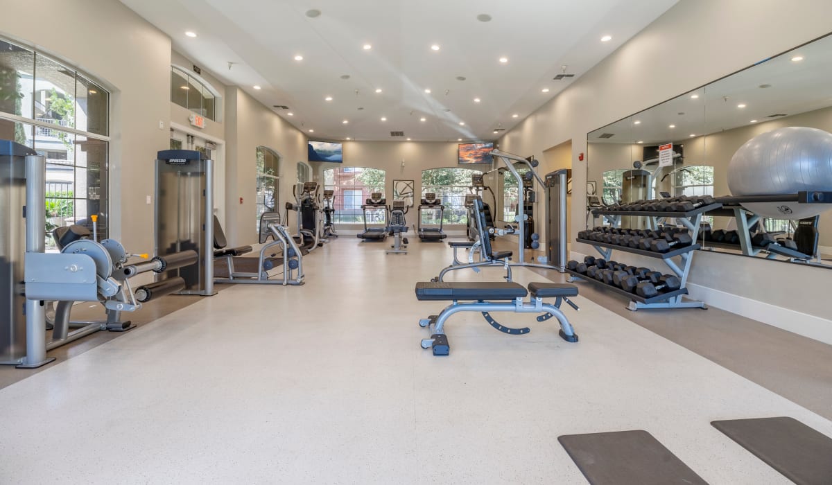 Equipment in the fitness center at Villagio Luxury Apartments in Sacramento, California