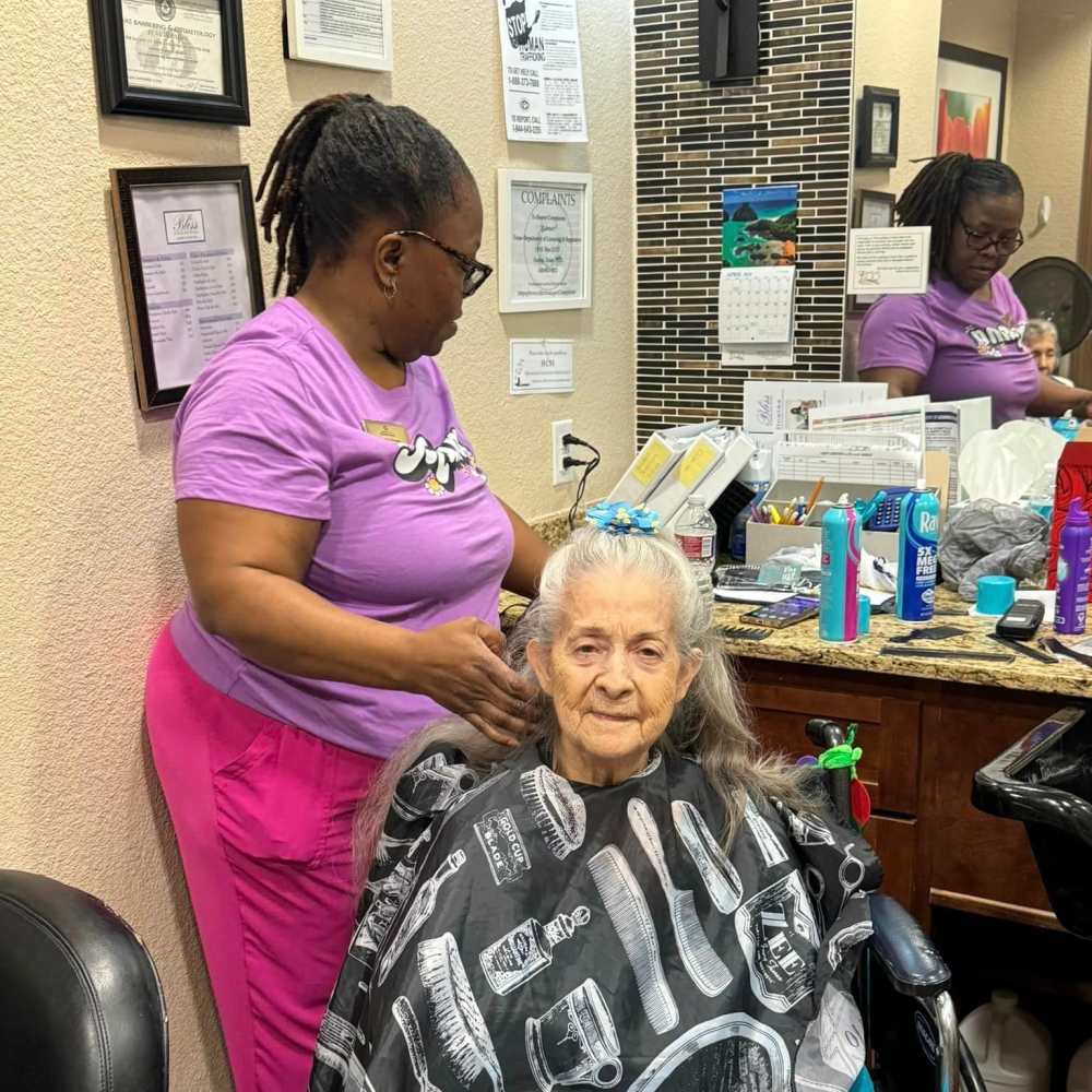 Resident at salon at The Landing at Stone Oak Memory Care in San Antonio, Texas