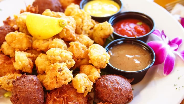 A close up of a popcorn shrimp appetizer platter at a Midland restaurant.
