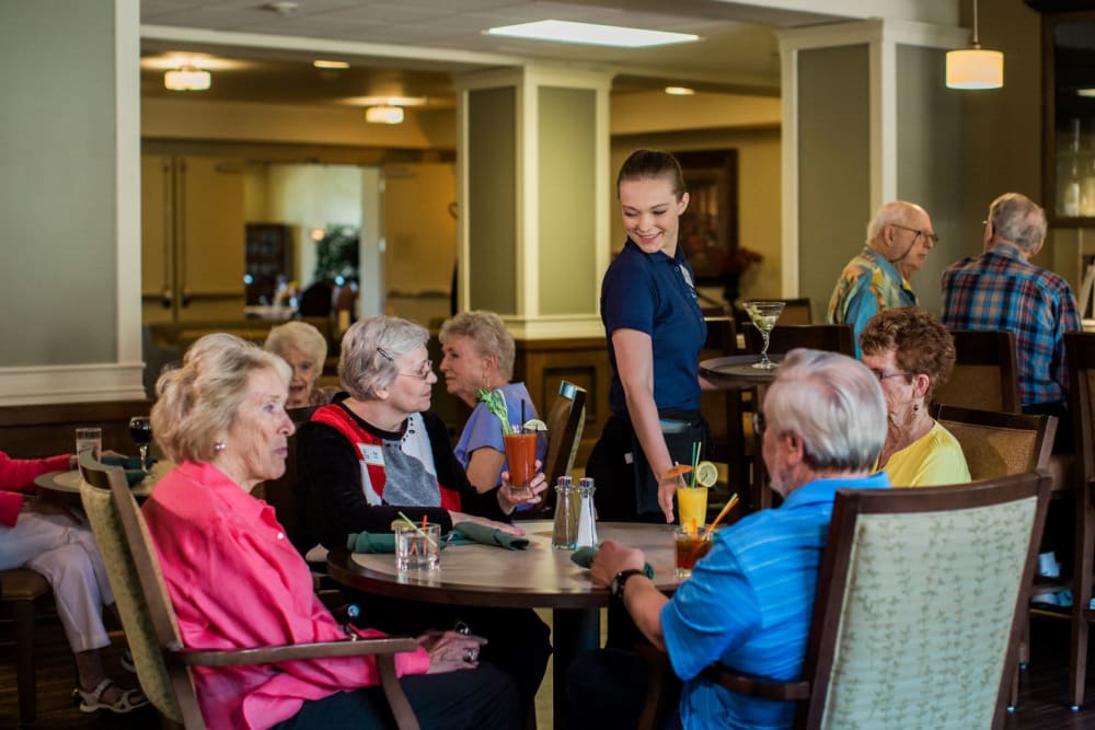 Residents enjoying cocktails at The Springs at Veranda Park in Medford, Oregon