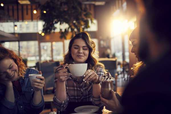 A resident enjoying a coffee at work near Nanda on Pacific in Santa Cruz, California