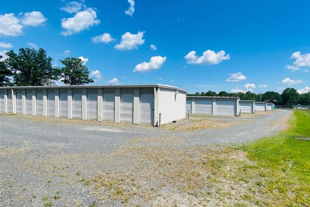 Two rows of smaller storage units outside at KO Storage in Berkeley Springs, West Virginia