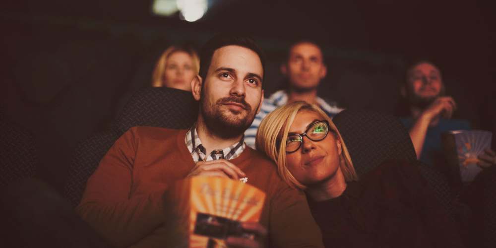 A couple watching a movie near The Concord in Wilmington, Delaware