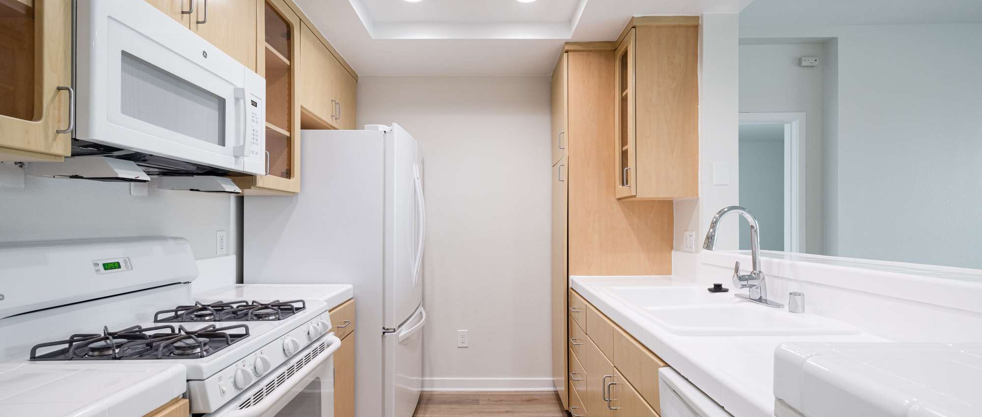 Kitchen with facilities at Capri Apartments in Marina Del Rey, California