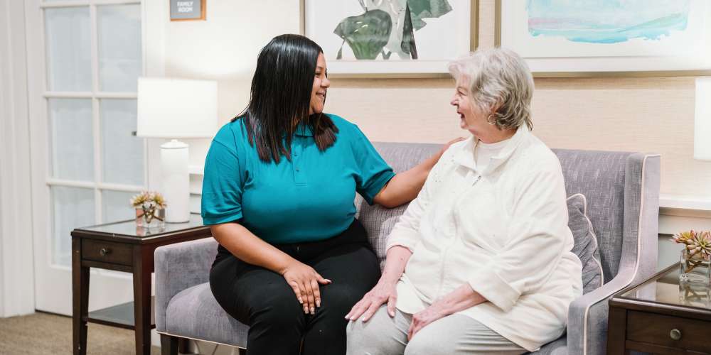 Resident with an assistant at The Barclay at Little River in Little River, South Carolina