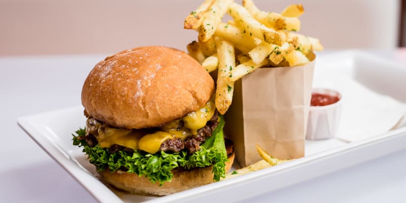 A burger and fries in a restaurant near Perry Circle Apartments in Annapolis, Maryland