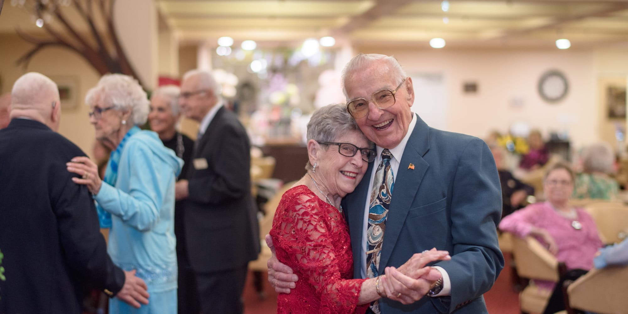A happy couple dancing at Liberty Heights Gracious Retirement Living in Rockwall, Texas