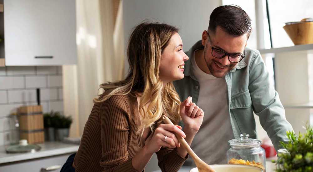 Couple in the apartment kitchen at Cannongate Apartments in Vicksburg, Mississippi