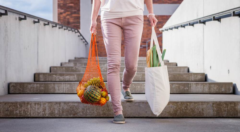 Resident shopping groceries near Eleven600 in Dallas, Texas