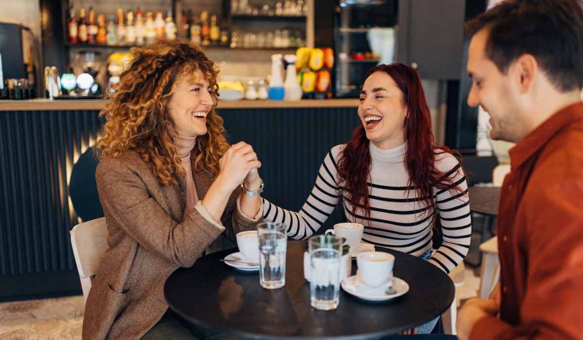 Friends having coffee at the cafe near The Gramercy Residences in Las Vegas, Nevada