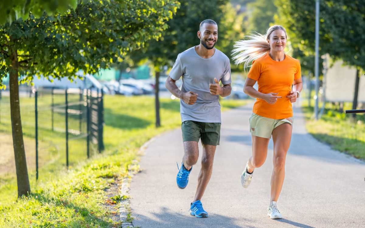 A resident couple jogging at a park near Pelican Isles Apartments in Sebastian, Florida