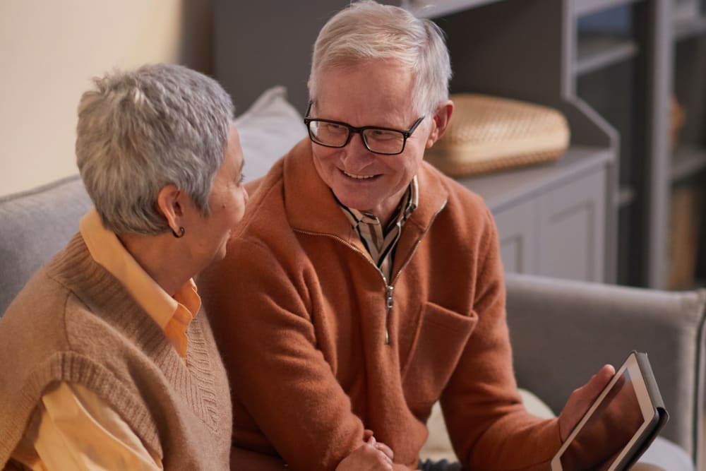 Couple reading a book at Grandon Village in San Marcos, California