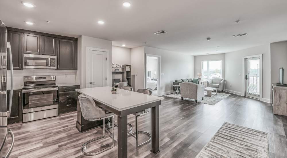 Kitchen with stainless-steel appliances at Newport Avenue Apartments in Rumford, Rhode Island