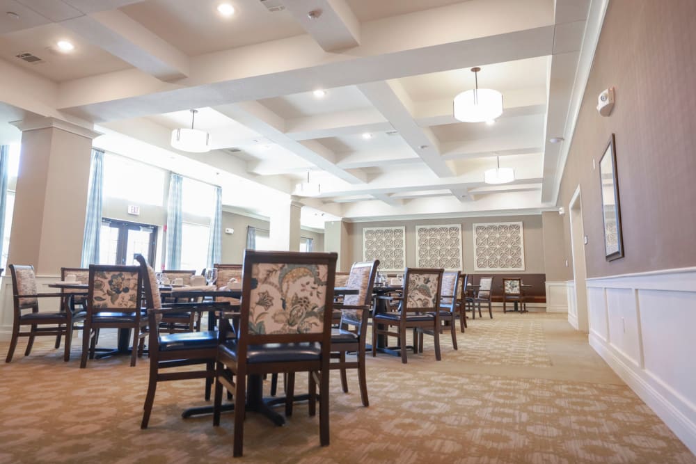 Spacious dining room with tall ceilings and plenty of seating at The Princeton Senior Living in Lee's Summit, Missouri