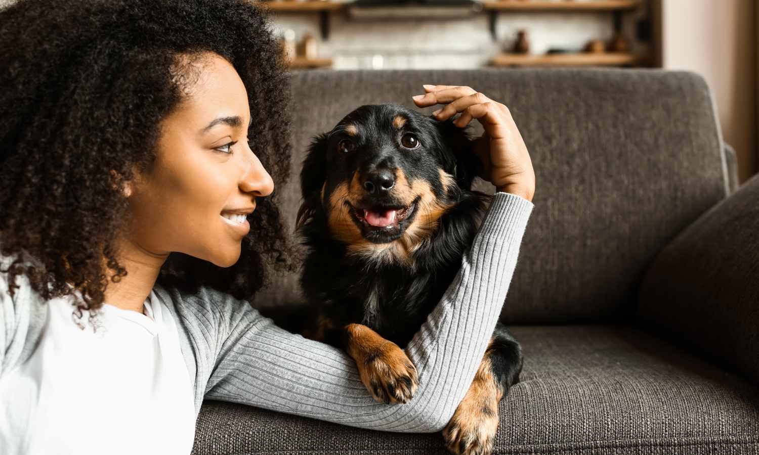 Resident playing with her dog at The Rise at Regency in Henrico, Virginia