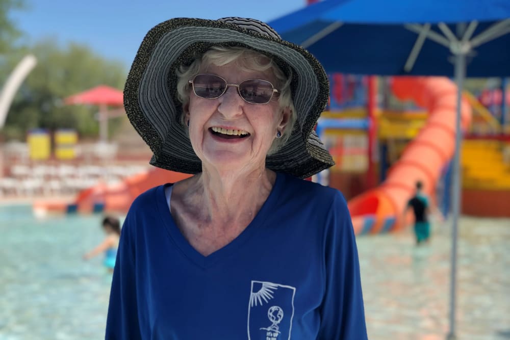 senior resident enjoying the pool at Merrill Gardens at Anthem in Anthem, Arizona
