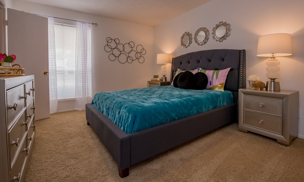 Large bedroom with windows at Windsail Apartments in Tulsa, Oklahoma