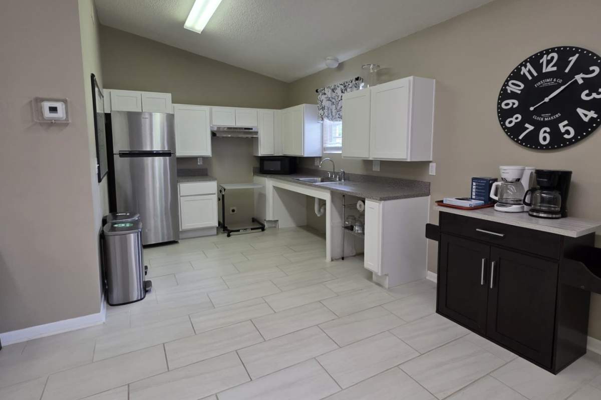 Modern kitchen with stainless steel appliances at Cottages of Shippensburg in Shippensburg, Pennsylvania