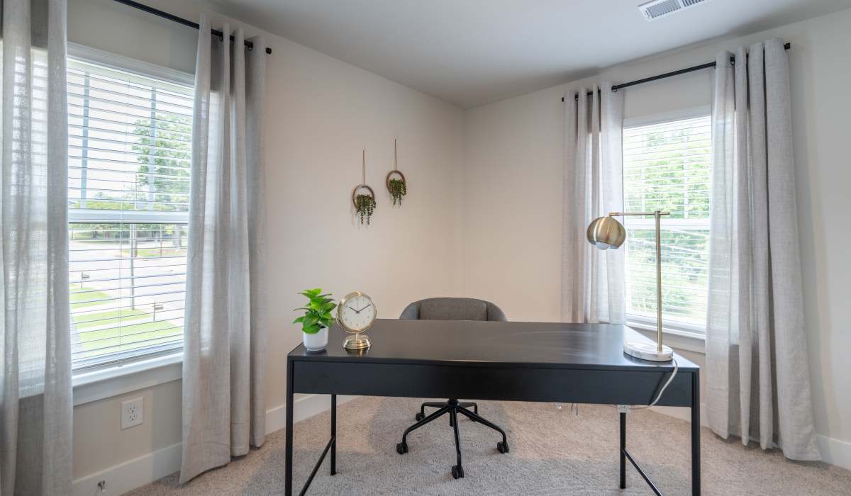 Living room with office space at Maybrook Terraces in Greenville, South Carolina