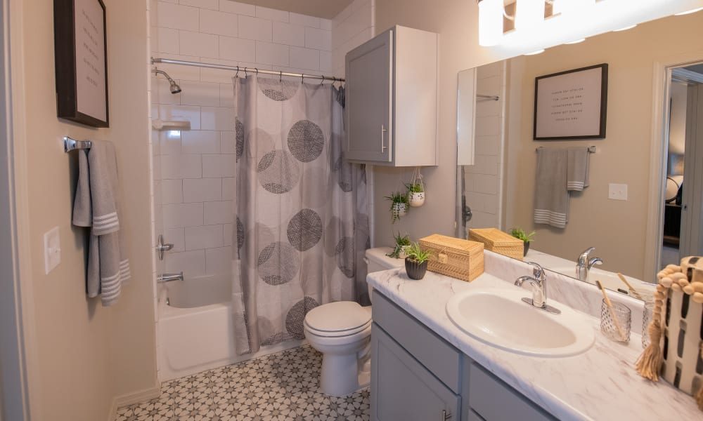 Large bathroom at Bend at New Road Apartments in Waco, Texas