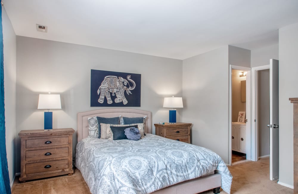 Well decorated model bedroom at Moorestowne Woods Apartment Homes in Moorestown, NJ
