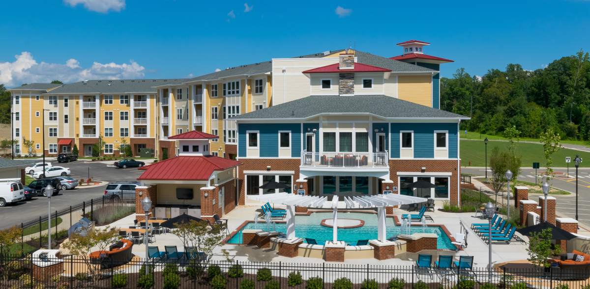 Apartments with resort-style pool at Attain at Quarterpath, Williamsburg, Virginia
