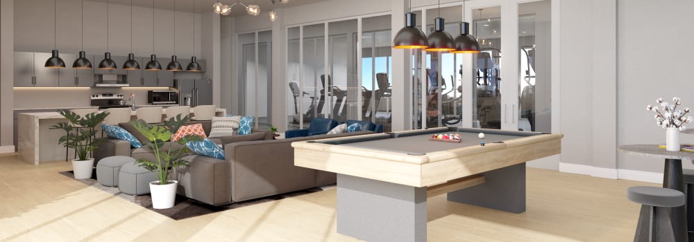Clubhouse with lounge seating and pool table at Global Ruston in Ruston, Louisiana