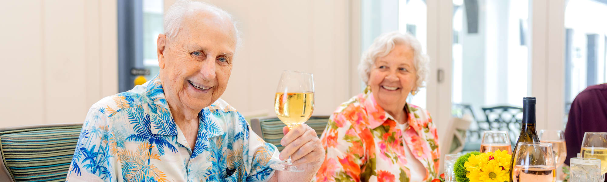 Residents having fun and drinking wine at The Barclay at Tuckahoe in Henrico, Virginia
