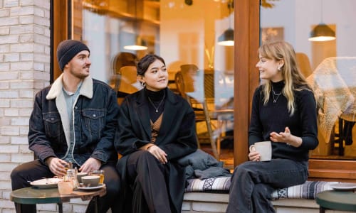 Residents at a coffee shop near Broadway Towers in Concord, California