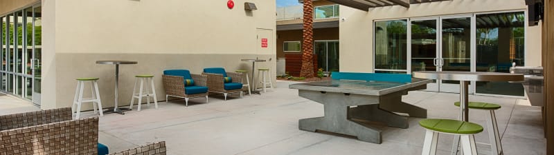 outdoor ping pong at Avia McCormick Ranch Apartments's lobby in Scottsdale, Arizona