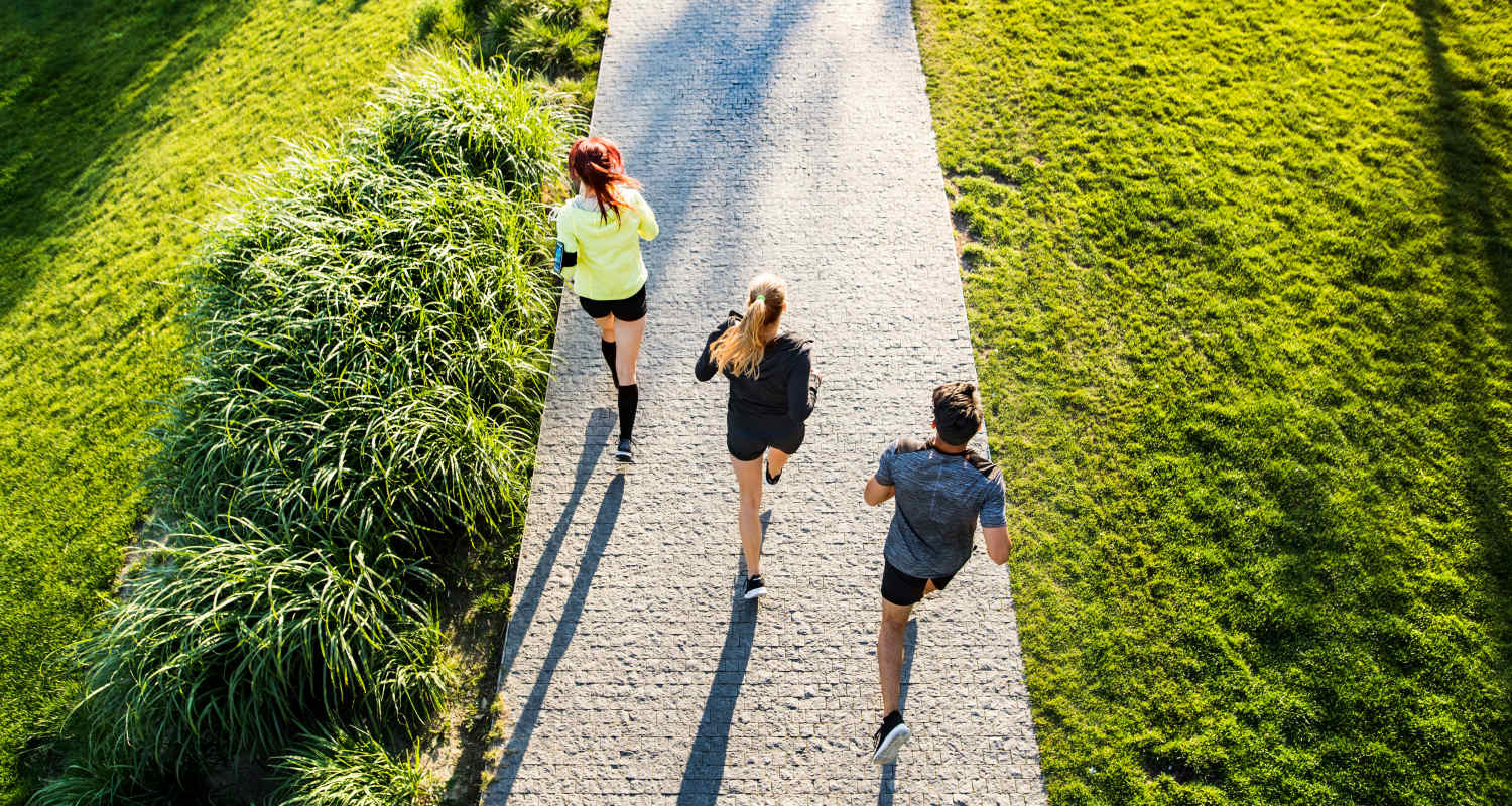 Residents jogging in a park near Forest Creek in Oklahoma City, Oklahoma