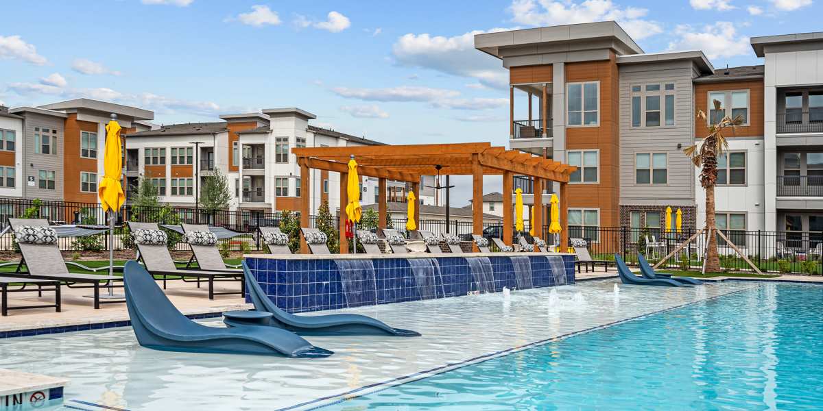 Resort-style swimming pool at SunRidge Management Group in Dallas, Texas