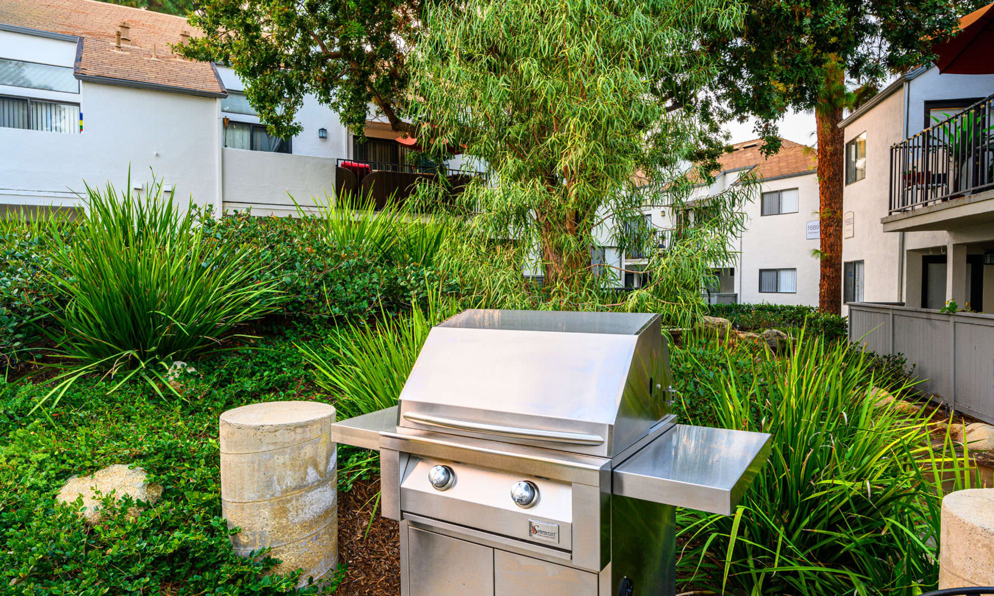 Barbecue area with a gas grill at Pleasanton Place Apartment Homes in Pleasanton, California
