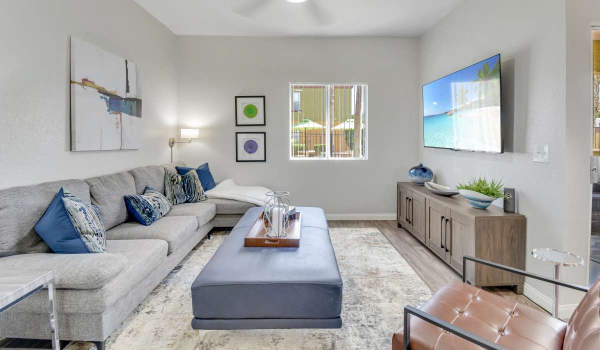 Model dining room with a view of the kitchen at La Serena at the Heights in Henderson, Nevada