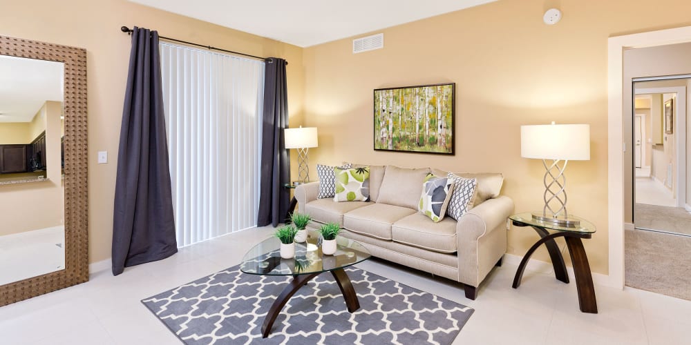 Model living room at Quantum Lake Villas Apartments in Boynton Beach, Florida