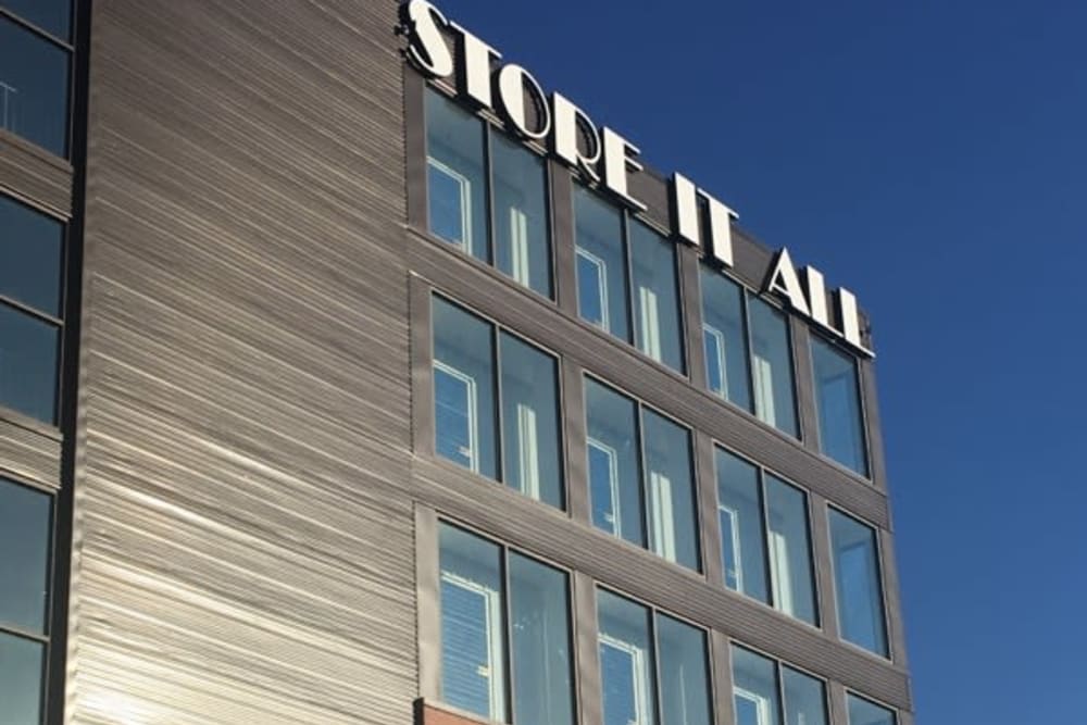 Multi-floor facility with glass windows at Store It All Self Storage - Baltimore in Baltimore, Maryland