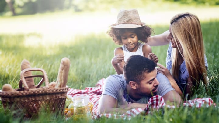 Family on a picnic near The Slate in Savannah, Georgia