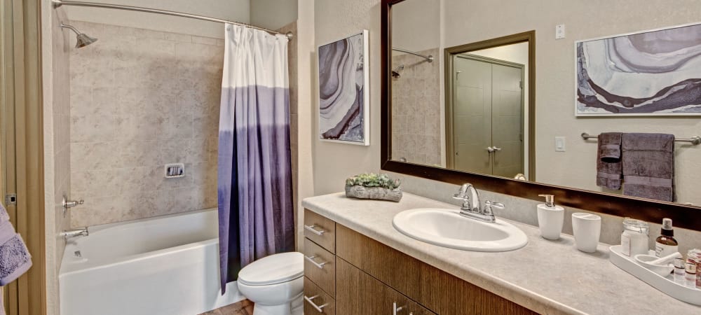 Large bathroom with ample counter space at The Courtney at Lake Shadow in Orlando, Florida