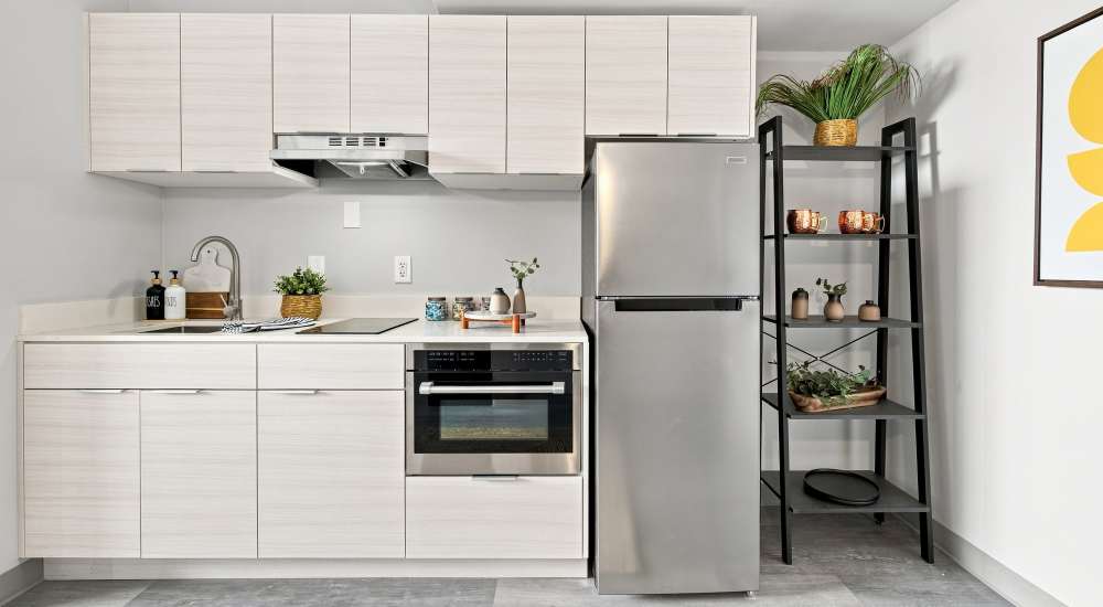 Kitchen with white cabinets at The Simone in Silver Spring, Maryland