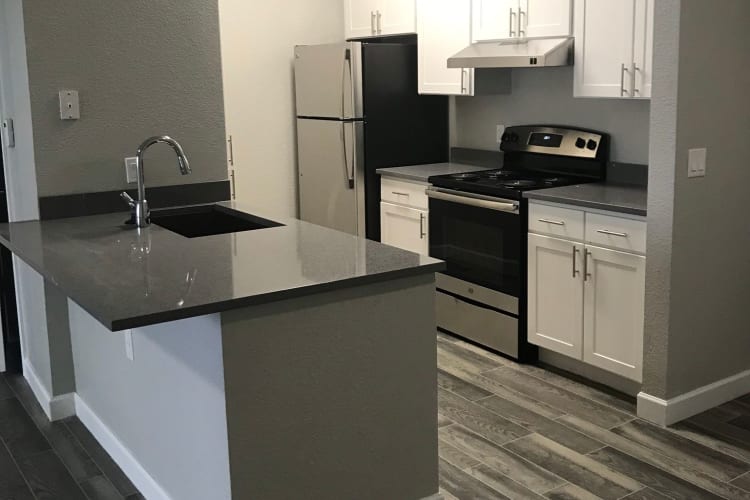 Kitchen layout at Alpine Meadows Apartments in Sandy, Utah