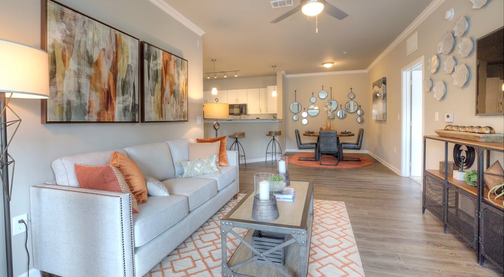 A furnished apartment living room at Lullwater at Blair Stone in Tallahassee, Florida